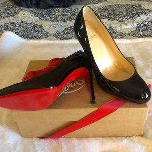 Never Worn Christian Louboutin Pump Black 8